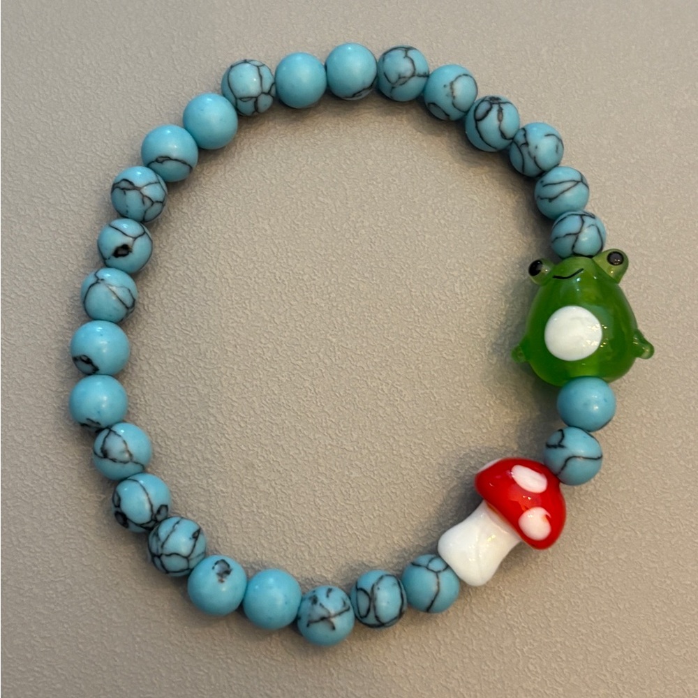 Turquoise Beaded Bracelet with Green Frog and Red Mushroom Charm